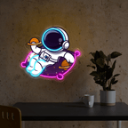 Cute Astronaut Holding Planet Artwork LED neon sign by NeonCS